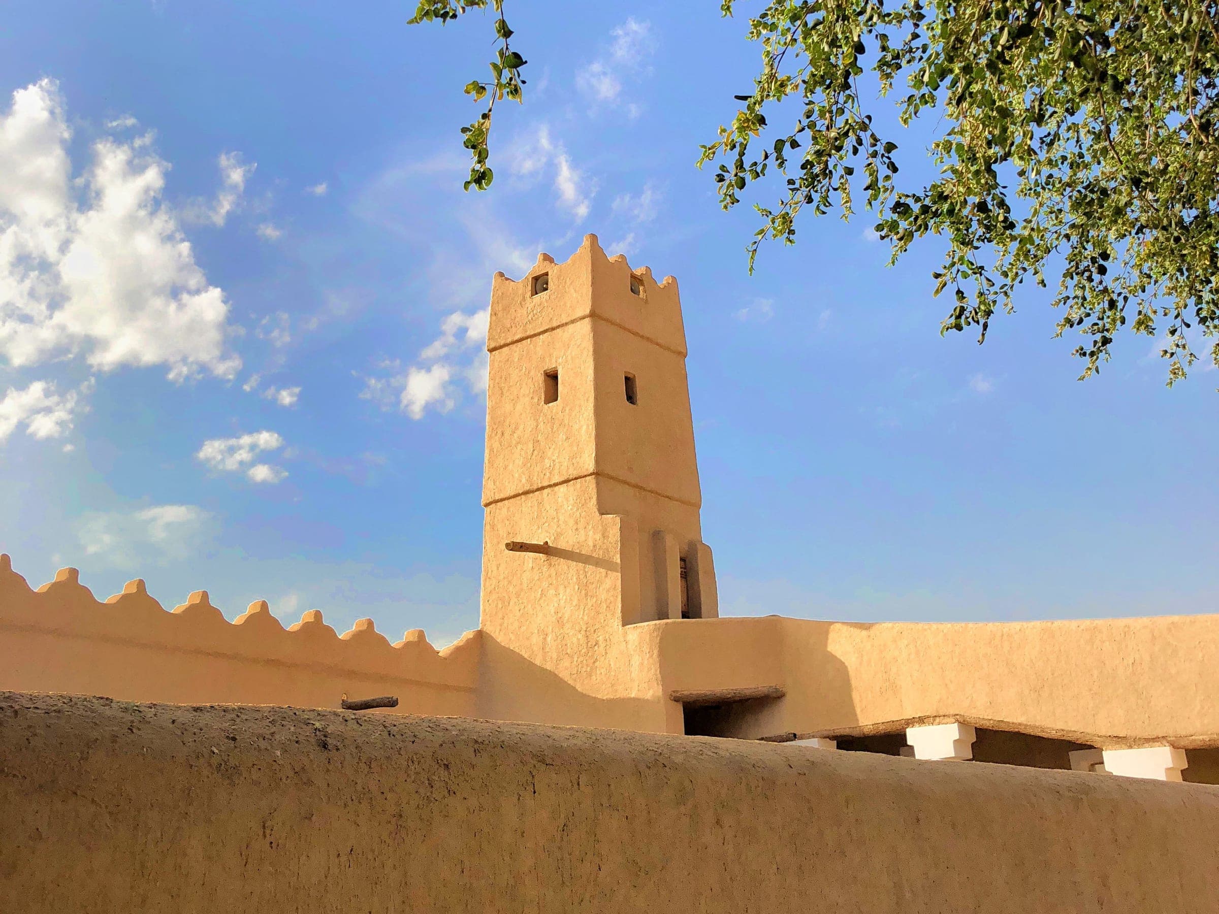 A mud-brick watchtower and crenellated wall in Diriyah, the Najdi architecture of the first Saudi capital