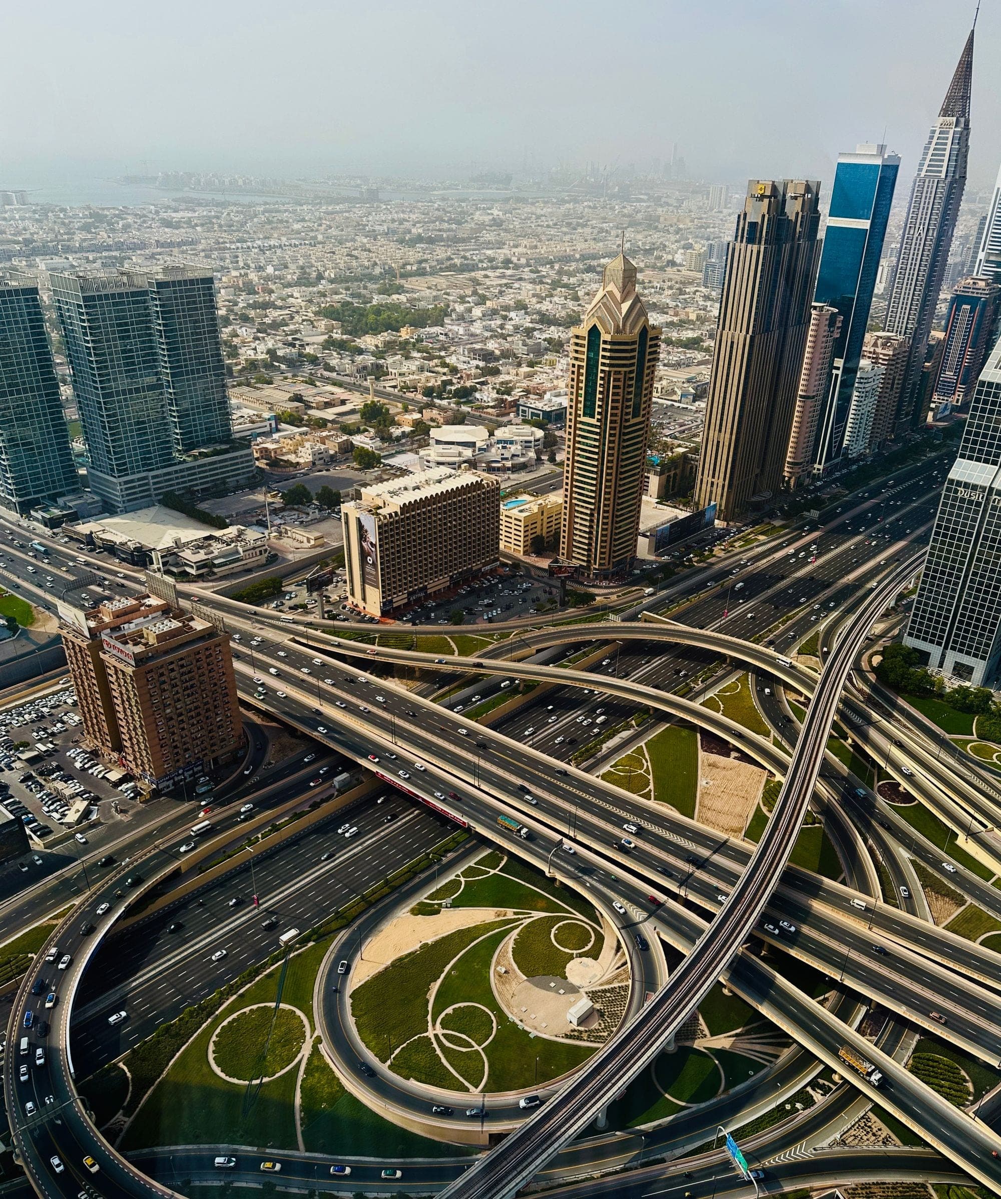 Sheikh Zayed Road and the Dubai towers from above, the far end of a Riyadh to Dubai crossing