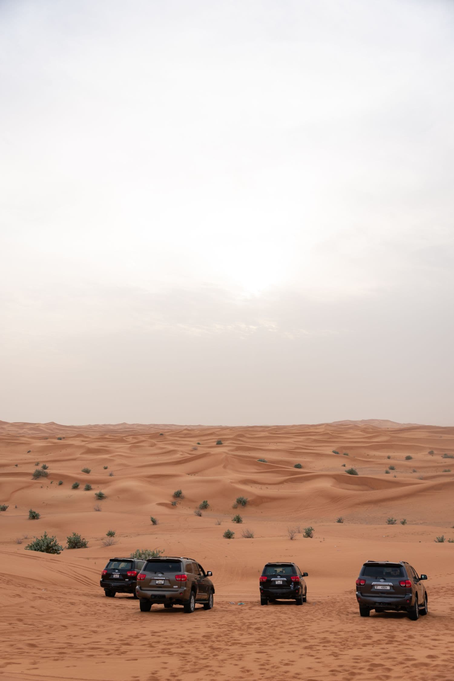 Four SUVs crossing the sand outside Riyadh, the vehicle class the final track needs