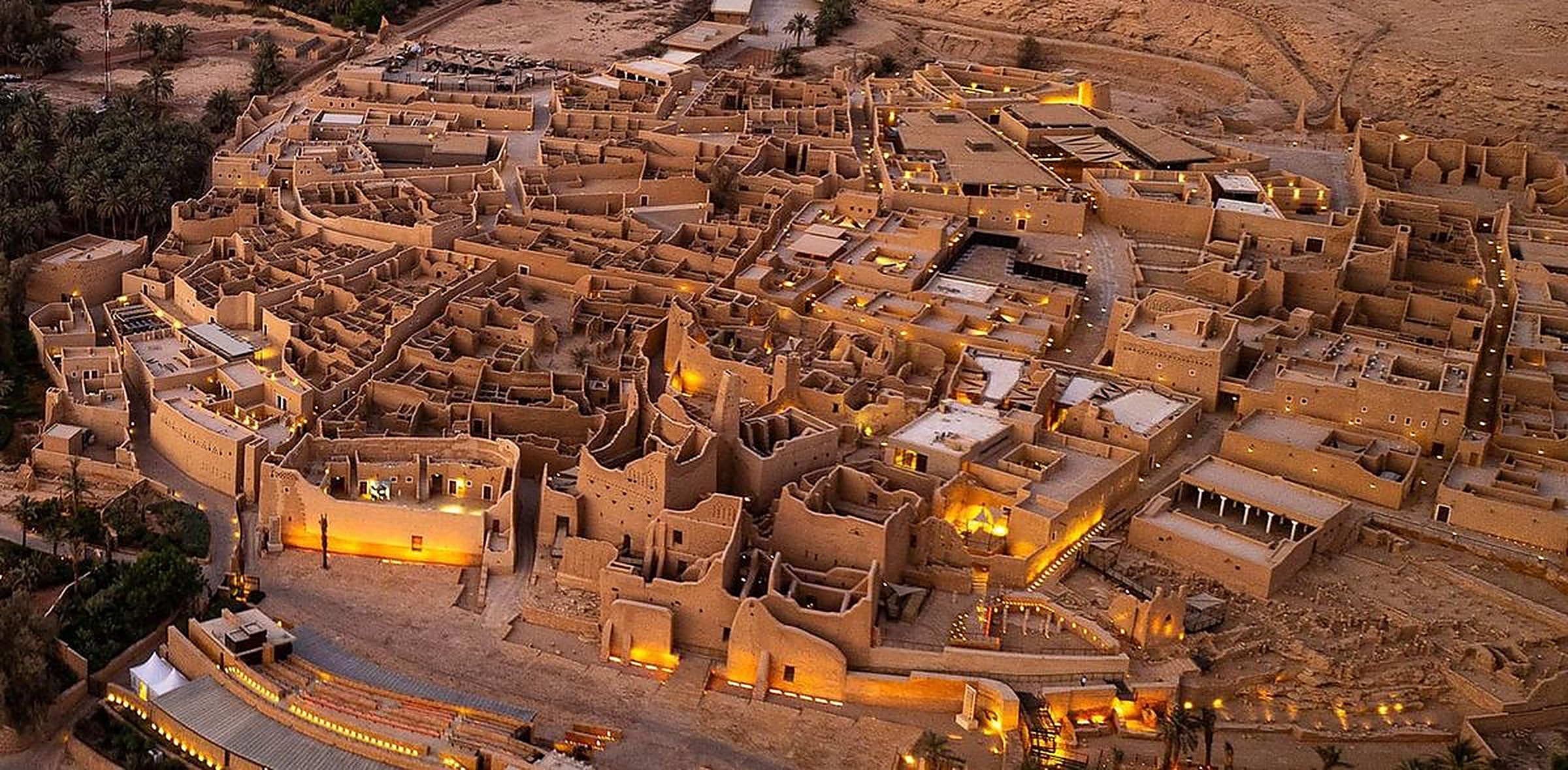 At-Turaif in Diriyah lit at dusk, the mud-brick palaces of the First Saudi State above Wadi Hanifah