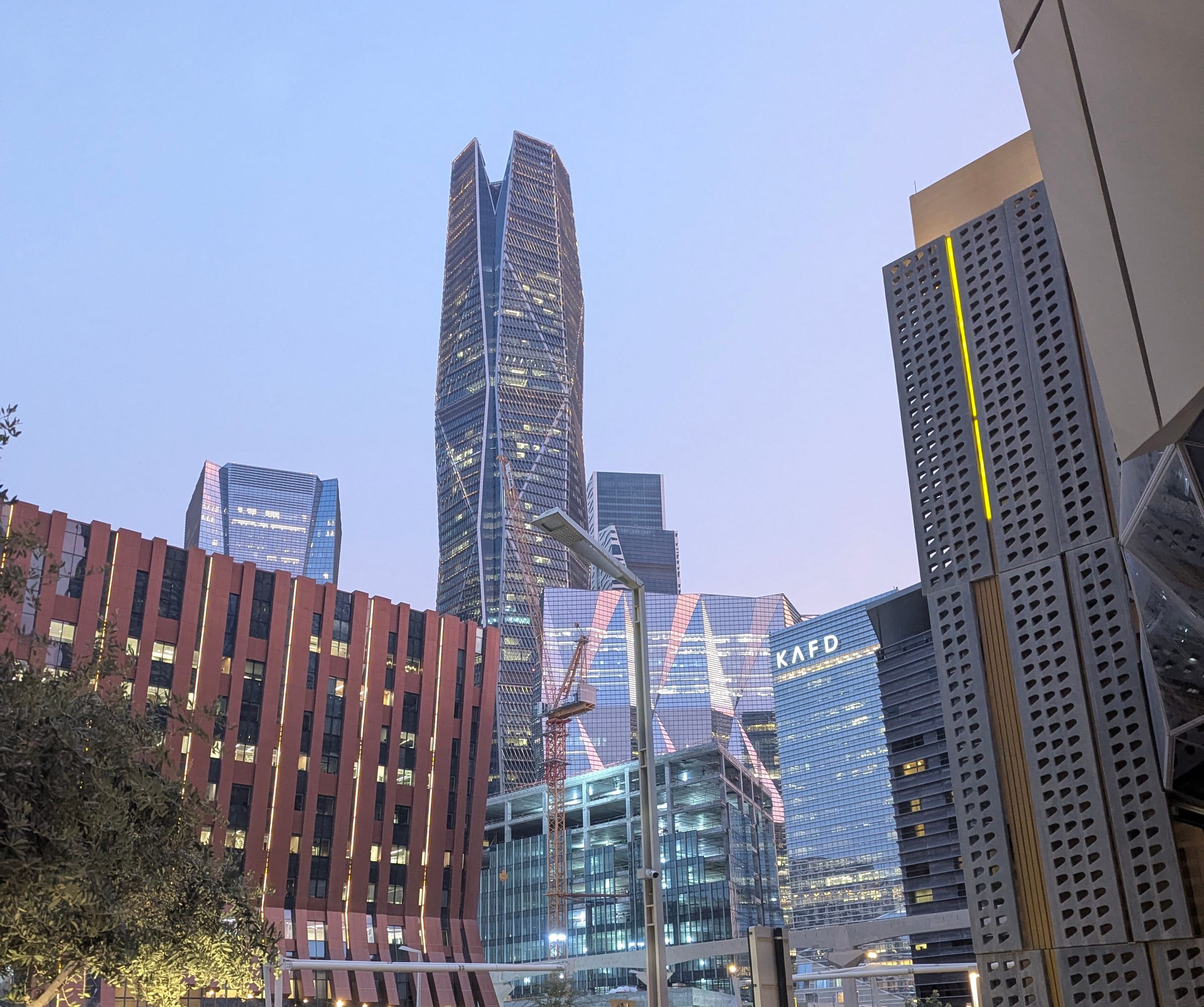 The KAFD towers in Riyadh at dusk, the corporate district CHAUFFIQ accounts run between